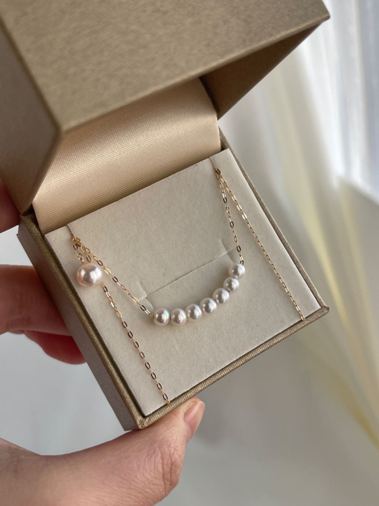Close-up of 4.5mm Japanese Akoya Pearls with High Luster – Station Necklace 1