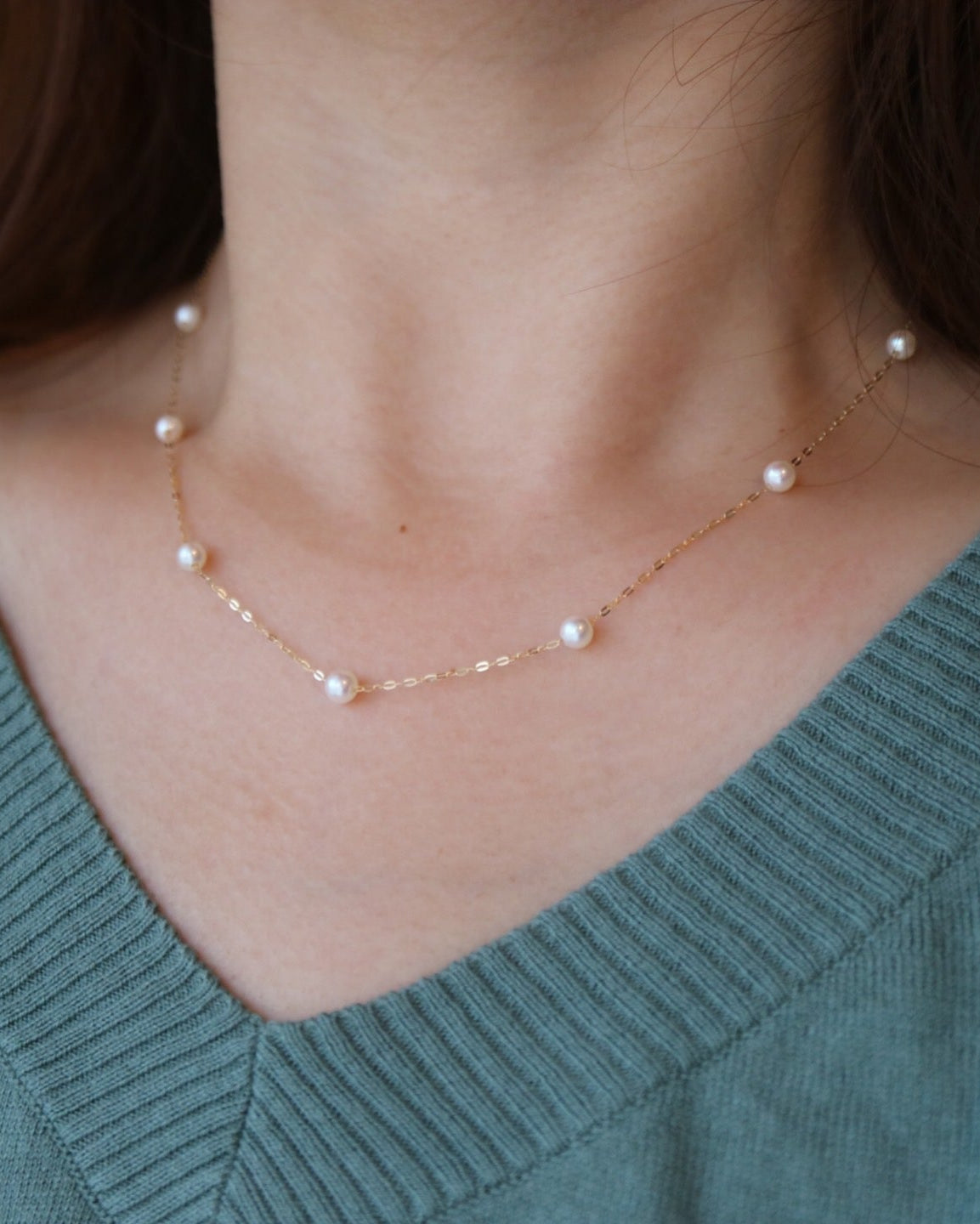 Model Wearing 18K Gold Akoya Pearl Station Necklace 2