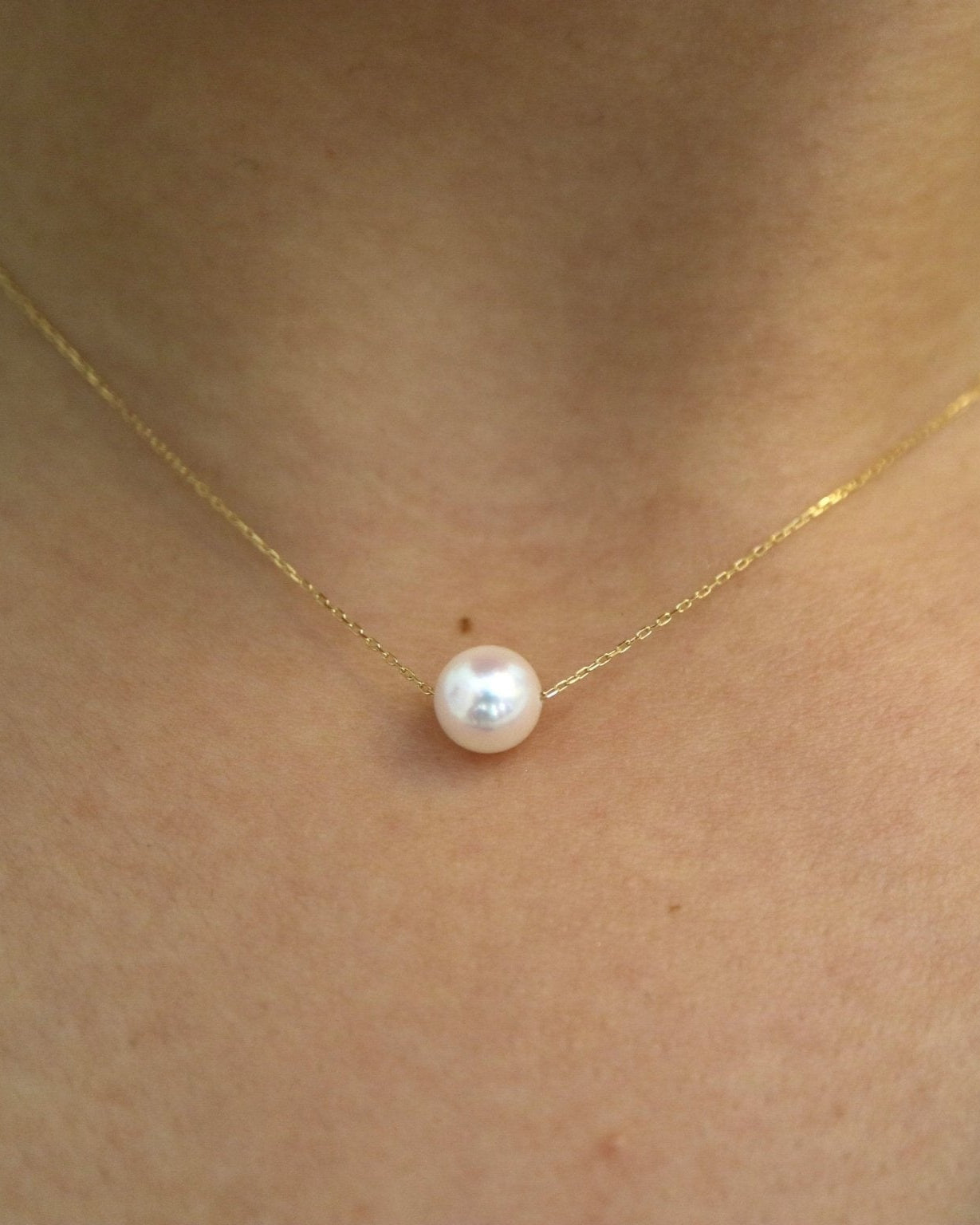 Side View of Model Wearing Japanese Akoya Floating Pearl Necklace - 1