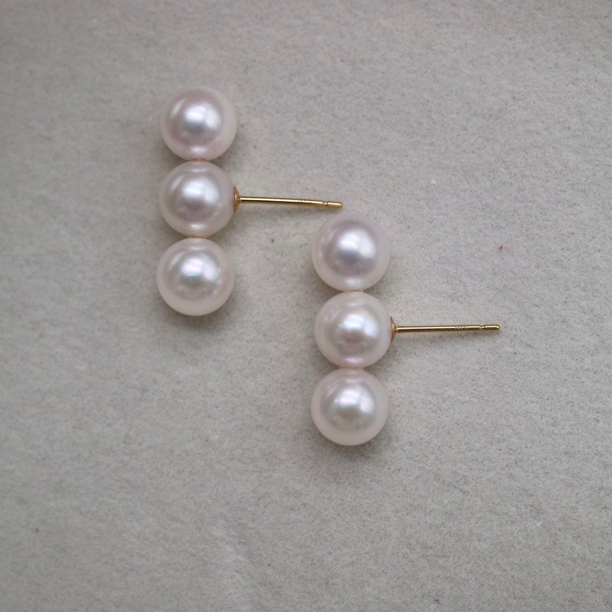 Three-pearl drop earrings with lustrous Akoya pearls and gold posts, handmade Japanese pearl jewelry