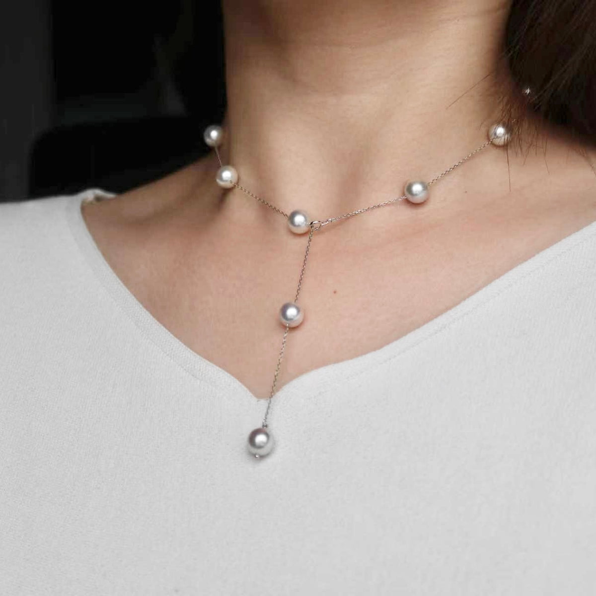 Elegant Akoya pearl necklace with delicate chain and lustrous pearls, perfect for everyday wear.